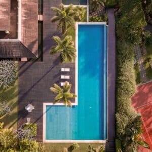Photo What Are the Considerations for Pool Builders when Designing Pools in Regions with Strict Zoning or Building Regulations?