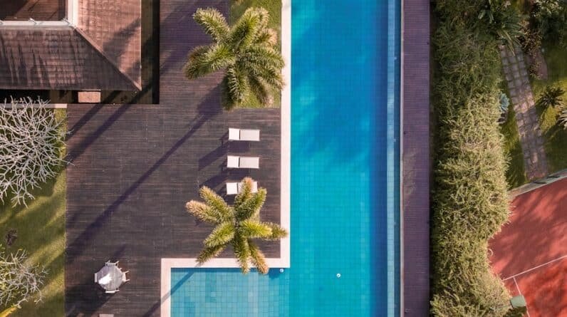 Photo What Are the Considerations for Pool Builders when Designing Pools in Regions with Strict Zoning or Building Regulations?