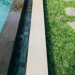 Photo "What Role Does Landscaping Play in Enhancing the Overall Pool Area Aesthetics?"