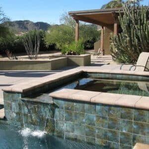 Photo Yes, pool builders can incorporate sustainable landscaping practices in the pool area