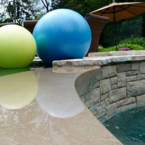 Photo "How Do Pool Builders Ensure That the Pool Area is Designed with Adequate Drainage and Runoff Solutions?"